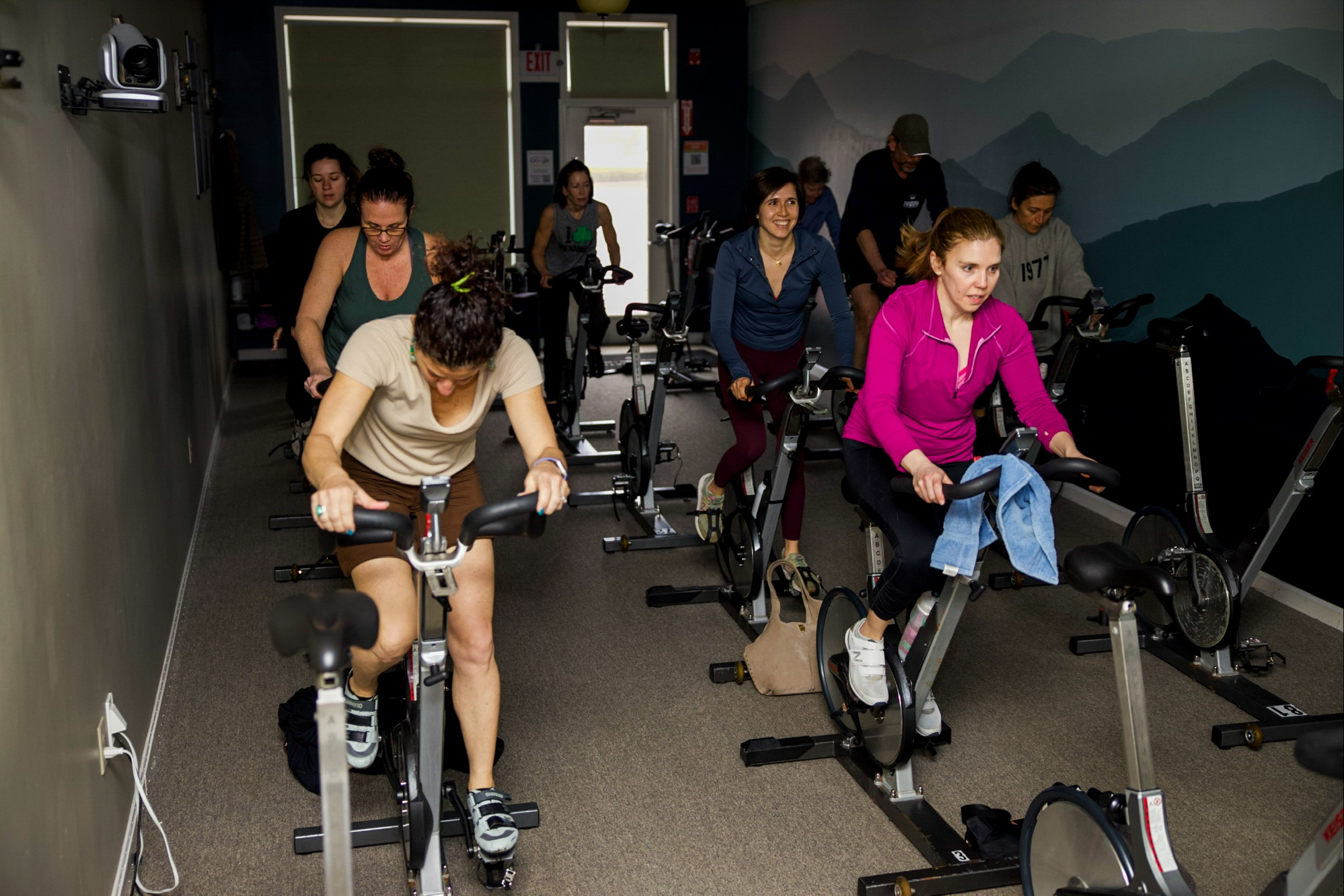 Indoor cycling bikes lined up at The Core Connection studio